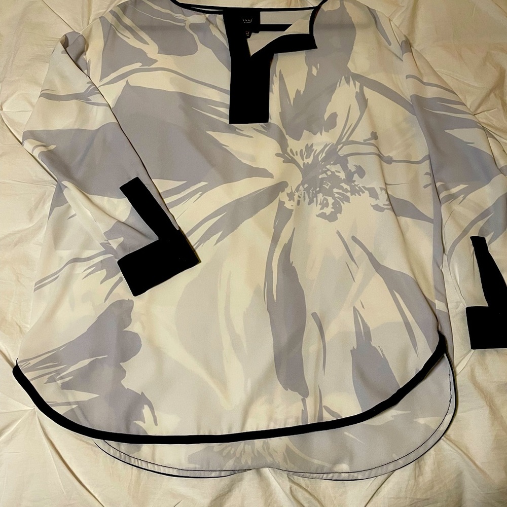 Woman’s blouse, professional. Size small, but runs large. Navy and off-white.